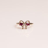 14k yellow gold pear shape pink tourmalines, lab grown diamond bow ring 