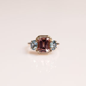 14k yellow gold emerald cut pink tourmaline, oval blue sapphire side stones ring 