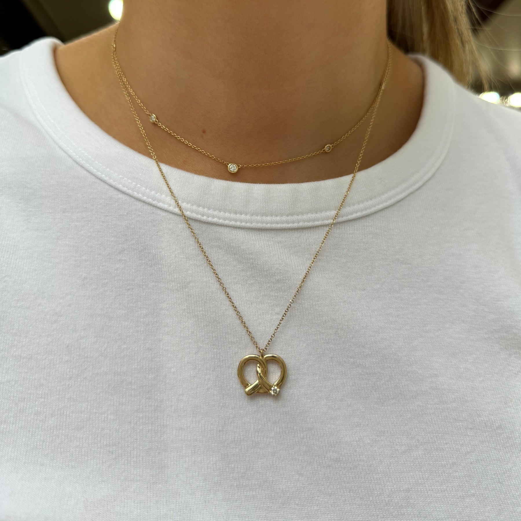 14k yellow gold pretzel pendant  necklace with diamond accent