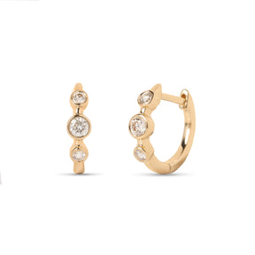 14k yellow gold three bezel set round diamond huggie earrings