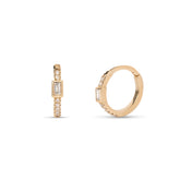 14k yellow gold diamond pave huggie earrings with bezel set baguette diamond