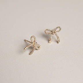 14k yellow gold diamond pave bow stud earrings